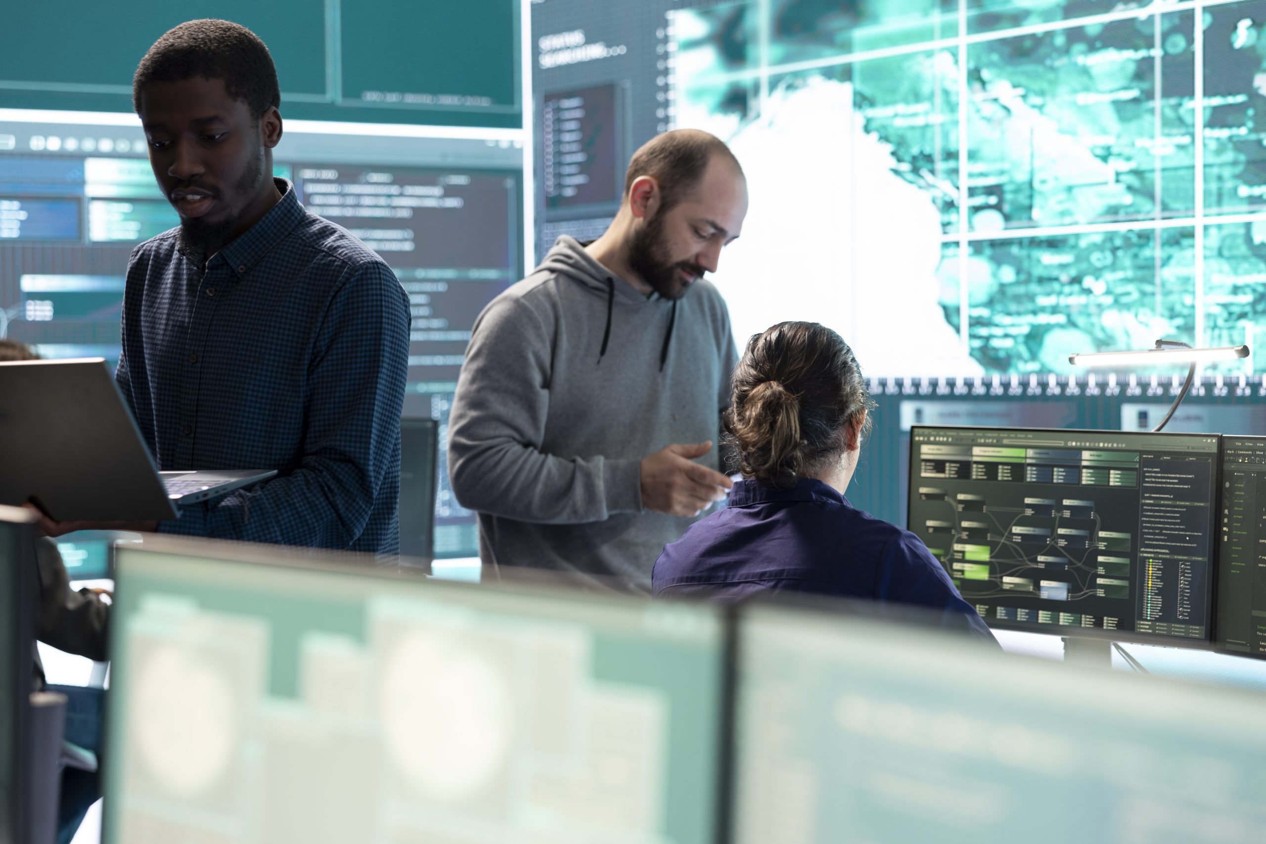 governmental-hackers-working-computer-network-high-tech-office-scaled